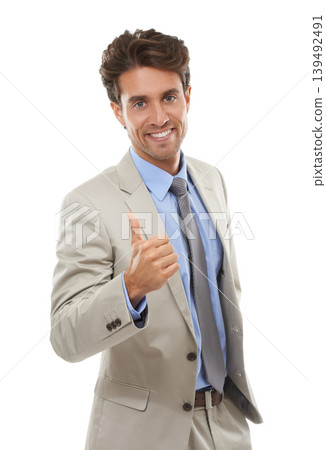 Portrait, business man and thumbs up in studio for winning deal, success icon or achievement on white background. Happy employee, emoji sign or like for feedback, vote yes or thank you for excellence Portrait, business man and thumbs up in studio for winning deal, success icon or achievement on white background. Happy employee, emoji sign or like for feedback, vote yes or thank you for excellence 139492491