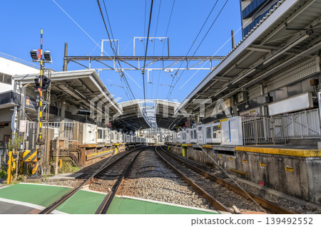 Urban landscape of Shinagawa Ward, Tokyo: The railway tracks and platform of Togoshi-Koen Station. Urban landscape of Shinagawa Ward, Tokyo: The railway tracks and platform of Togoshi-Koen Station. 139492552