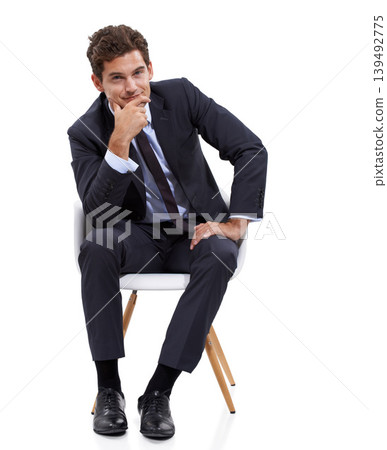 Thinking, portrait and businessman in studio in a chair on white background or mock up space. Entrepreneur, insight and manager sitting with ideas, planning or boss with mindset for strategy 139492775