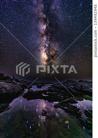 The Milky Way and starry sky shining over Tsukazaki Beach in Yakushima The Milky Way and starry sky shining over Tsukazaki Beach in Yakushima 139492948