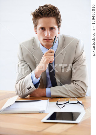 Business man, thinking and serious in portrait, professional and planning on tablet or paperwork. Male person, confidence and contemplating strategy for company future in office, face and technology 139493016