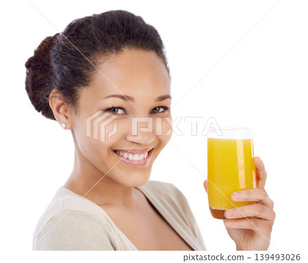 Happy, portrait or woman with orange juice in studio for wellness, nutrition or detox on white background. Face, smile or female nutritionist with glass of vitamin C, supplement or health fruit drink 139493026