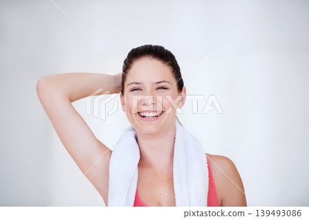 Laughing, white background or portrait of happy athlete with towel for fitness or wellness with confidence. Smile, funny model or healthy sports woman ready to start workout, training or exercise Laughing, white background or portrait of happy athlete with towel for fitness or wellness with confidence. Smile, funny model or healthy sports woman ready to start workout, training or exercise 139493086