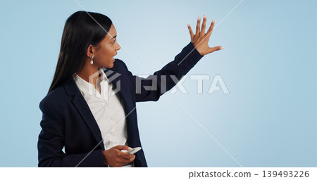 Business woman, presentation and reporter in advertising against a blue studio background. Female person, employee or journalist speaker showing weather, teaching or information on mockup space Business woman, presentation and reporter in advertising against a blue studio background. Female person, employee or journalist speaker showing weather, teaching or information on mockup space 139493226