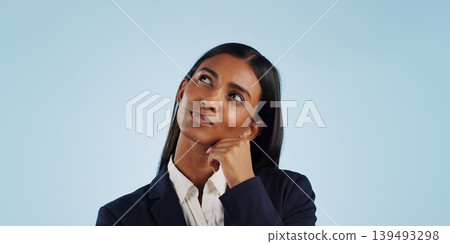 Thinking, studio or businesswoman on blue background for problem solving, vision or solution. Idea, doubt or decision with a female attorney or lawyer contemplating a thought, choice or legal option Thinking, studio or businesswoman on blue background for problem solving, vision or solution. Idea, doubt or decision with a female attorney or lawyer contemplating a thought, choice or legal option 139493298