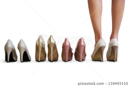 Woman, many shoes and studio with feet, choice or mockup space on floor for fashion by white background. Person, model and high heels for trendy style, decision or legs for promotion with retail deal Woman, many shoes and studio with feet, choice or mockup space on floor for fashion by white background. Person, model and high heels for trendy style, decision or legs for promotion with retail deal 139493310