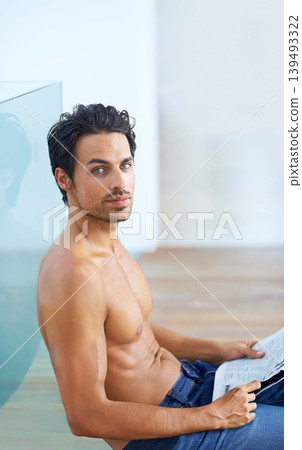 Man, newspaper and shirtless or portrait for news, article or story on floor with relax and calm expression. Person, face and information update or break with tattoo, peace or routine in apartment Man, newspaper and shirtless or portrait for news, article or story on floor with relax and calm expression. Person, face and information update or break with tattoo, peace or routine in apartment 139493322