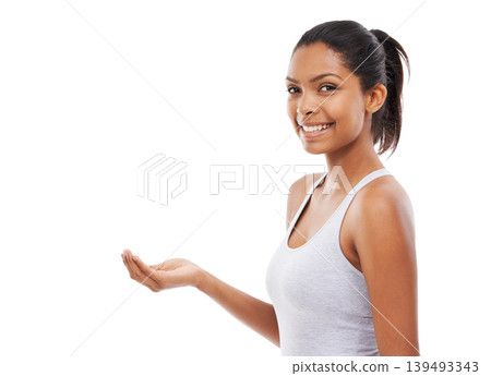 Portrait, advertising and space in the palm of a woman in studio isolated on white background for promo. Smile, marketing or presentation and the hand of a confident young person holding empty mockup 139493343