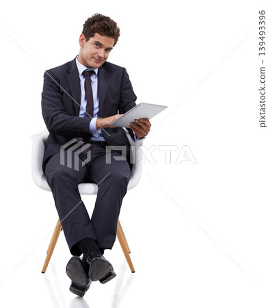 Studio, portrait and businessman with tablet in chair, working as manager in social media or networking. Tech, entrepreneur or person typing notes online with research or planning in white background Studio, portrait and businessman with tablet in chair, working as manager in social media or networking. Tech, entrepreneur or person typing notes online with research or planning in white background 139493396