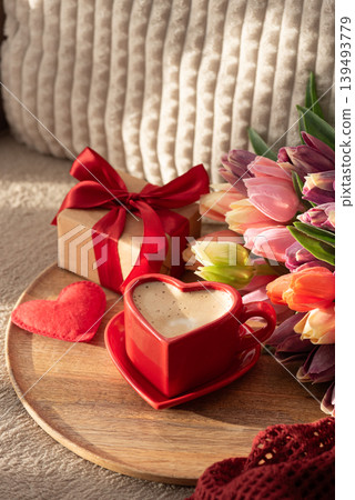 Heart Shaped Coffee Cup with Colorful Tulips and Gift Box. Heart Shaped Coffee Cup with Colorful Tulips and Gift Box. 139493779