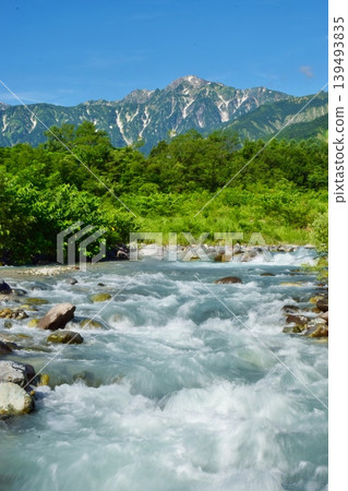 Hakuba Village in early summer, bathed in fresh greenery. Hakuba Village in early summer, bathed in fresh greenery. 139493835