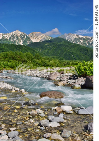 Hakuba Village in early summer, bathed in fresh greenery. Hakuba Village in early summer, bathed in fresh greenery. 139493849