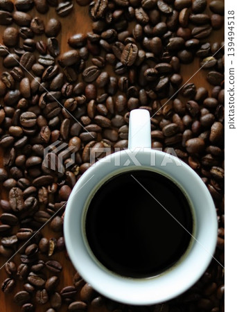 Coffee beans and coffee cup Coffee beans and coffee cup 139494518