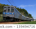 8500 series blue striped train running through Kodomo-no-Kuni (Children's Land) 139494716