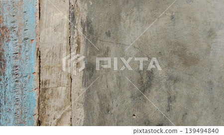 Rustic old concrete and wood wall texture with peeling paint. Rustic old concrete and wood wall texture with peeling paint. 139494840