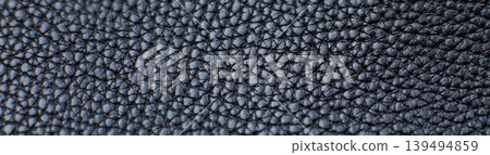 Black leather textured surface background showing pattern 139494859
