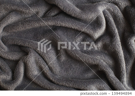 Gray wrinkled plush fabric background texture, soft material pattern Gray wrinkled plush fabric background texture, soft material pattern 139494894
