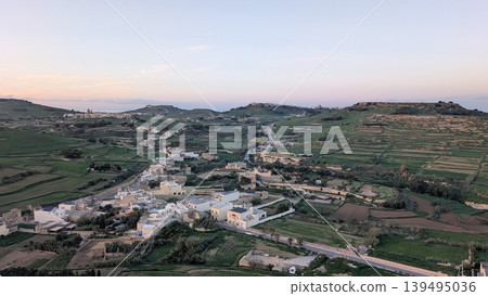 The landscape of the countryside seen from the hill in the evening of Gozo 139495036