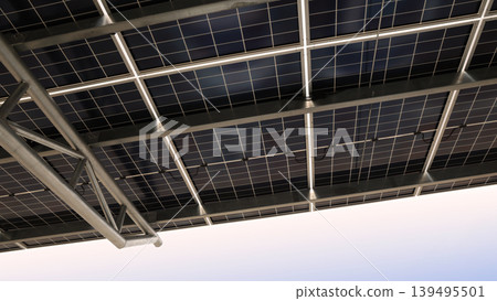 Solar panel car park roof. Low angle shot of Solar panel carport roof with steel structure generating clean renewable energy. Sustainable parking canopy with photovoltaic cells for eco power energy. 139495501