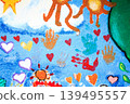 mural with handprints hearts sun and tree on blue background 139495557