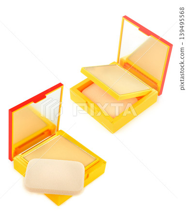 Yellow compact powder cases with sponge on white background Yellow compact powder cases with sponge on white background 139495568