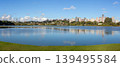 Vibrant blue water of Barigui Park lake and the Curitiba, Parana Brazil. 139495584