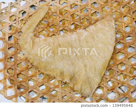 Processed premium shark fin on traditional woven bamboo tray Processed premium shark fin on traditional woven bamboo tray 139495648
