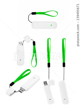 white usb modem with bright green strap in different positions on light background 139495671