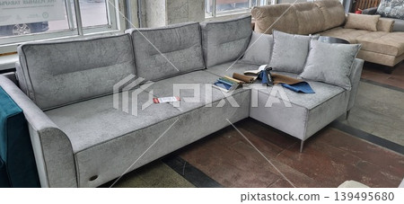 Brest, Belarus - 20.02.2024: Large sectional sofa displayed for architectural space planning and residential engineering research Brest, Belarus - 20.02.2024: Large sectional sofa displayed for architectural space planning and residential engineering research 139495680