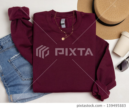 Blank dark red unisex sweatshirt mockup, apparel flat lay near jeans and accessories with copy space Blank dark red unisex sweatshirt mockup, apparel flat lay near jeans and accessories with copy space 139495883