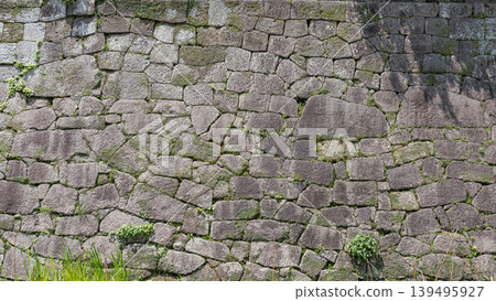 A Japanese-style texture material created by flatly cutting out the weathered stone walls of Tsurumaru Castle ruins (Kagoshima City) 139495927