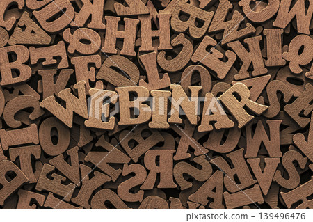 Inscription webinar on pile of old vintage wooden letters. Online education and training concept. Inscription webinar on pile of old vintage wooden letters. Online education and training concept. 139496476