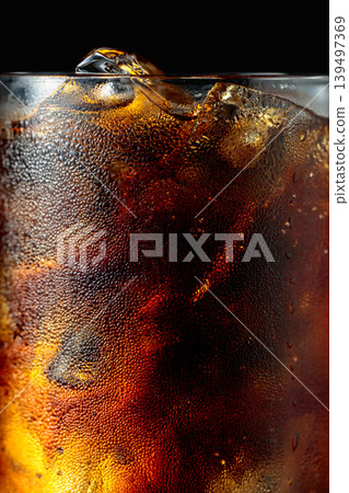 Cola with ice in misted glass. Cola with ice in misted glass. 139497369