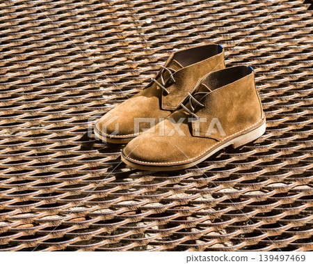 Stylish suede boots on mesh Stylish suede boots on mesh 139497469