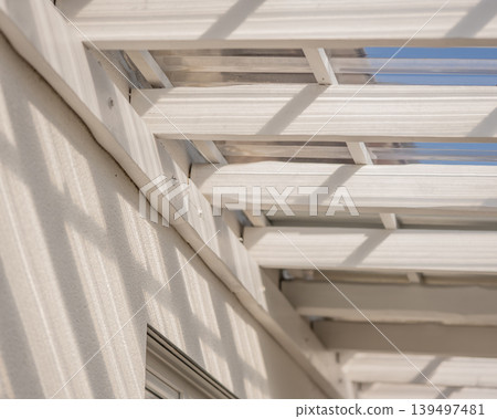 Sunlight dance on white beams 139497481