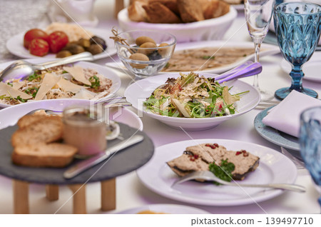 Delightful spread of colorful dishes at a feast Delightful spread of colorful dishes at a feast 139497710