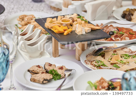 Culinary art displayed on elegant dining table Culinary art displayed on elegant dining table 139497733