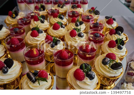 Sweet delights await at the dessert table Sweet delights await at the dessert table 139497758