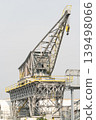 Old industrial Harbor Cargo Crane with Hook and Lattice Boom, Venice Italy 139498066