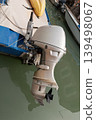 Outboard motor on small boat in Venice canal 139498067