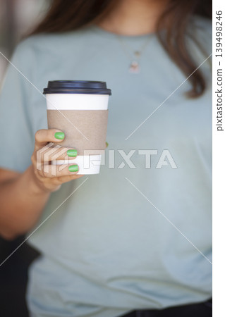 Woman Holding Takeaway Coffee Cup. Young Woman with Takeaway Coffee in Hand. Woman Holding Takeaway Coffee Cup. Young Woman with Takeaway Coffee in Hand. 139498246