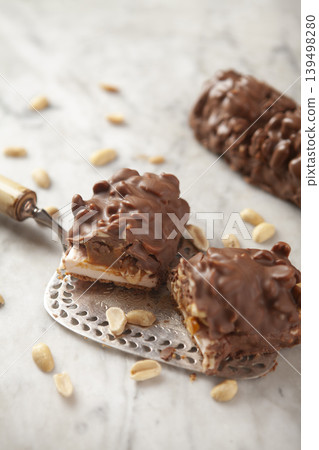 Homemade Peanut Chocolate Dessert. Artisan Chocolate Dessert with Peanuts. Homemade Peanut Chocolate Dessert. Artisan Chocolate Dessert with Peanuts. 139498280
