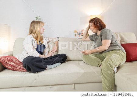 Women having serious conversation about family problems Women having serious conversation about family problems 139498493