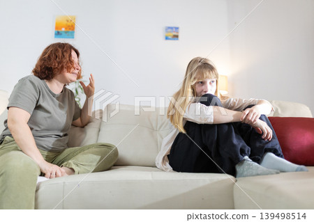 Mother arguing with daughter causing stress and fear Mother arguing with daughter causing stress and fear 139498514