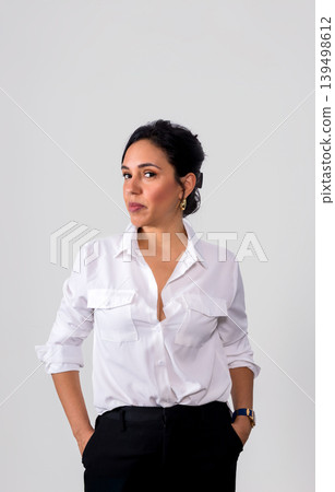 A woman in a white shirt 139498612