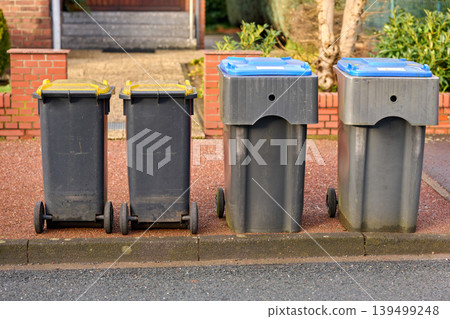Garbage bins beside the road Garbage bins beside the road 139499248