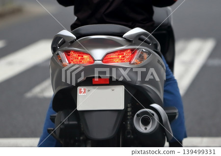 Image of a big scooter's taillight 139499331