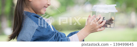 "I caught one!" A girl with no face catches beetles and other insects, enjoying insect collecting, discovery, and observation. "I caught one!" A girl with no face catches beetles and other insects, enjoying insect collecting, discovery, and observation. 139499645