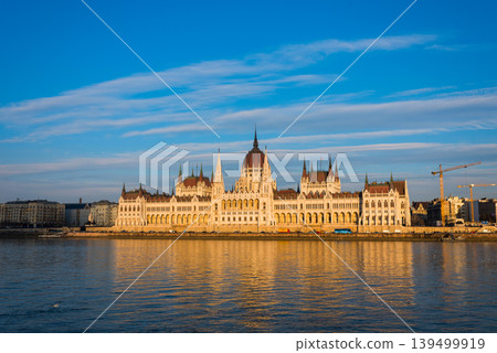 Explore the stunning architecture of Budapest against a vibrant sunset sky Explore the stunning architecture of Budapest against a vibrant sunset sky 139499919