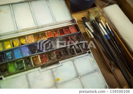 Colorful watercolor palette & brushes Colorful watercolor palette & brushes 139500106